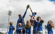 2 August 2017; Devin Toner, left, and Josh Van der Flier of Leinster pictured with kids Tom Clarke, Benjamin Brogan, Antonio Nicolletti, Elaine Hickey and Sophie O'Connor during a Bank of Ireland Leinster Rugby Summer Camp at Donnybrook Stadium in Donnybrook, Dublin. Photo by David Fitzgerald/Sportsfile