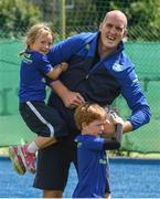 2 August 2017; Zoe Brennan, aged 6, jumps onto Devin Toner's arm during a Bank of Ireland Leinster Rugby Summer Camp at Donnybrook Stadium in Donnybrook, Dublin. Photo by David Fitzgerald/Sportsfile