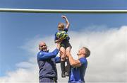2 August 2017; Devin Toner and Josh Van der Flier of Leinster lift up Matilda Scott during a Bank of Ireland Leinster Rugby Summer Camp at Donnybrook Stadium in Donnybrook, Dublin. Photo by David Fitzgerald/Sportsfile