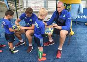 2 August 2017; Josh Van der Flier and Devin Toner of Leinster sign shirts during a Bank of Ireland Leinster Rugby Summer Camp at Donnybrook Stadium in Donnybrook, Dublin. Photo by David Fitzgerald/Sportsfile