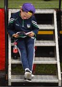 2 August 2017; Shane Ryan, age 11, from Knocklong, Co Limerick, studies his race card during the Galway Races Summer Festival 2017 at Ballybrit, in Galway. Photo by Cody Glenn/Sportsfile