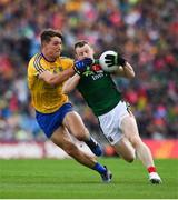 30 July 2017; Colm Boyle of Mayo is tackled by Sean Mullooly of Roscommon during the GAA Football All-Ireland Senior Championship Quarter-Final match between Mayo and Roscommon at Croke Park in Dublin. Photo by Ramsey Cardy/Sportsfile