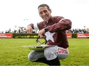 2 August 2017; Jockey Davy Russell celebrates by pretending to eat his dinner off the Galway Plate after winning the The Tote.com Galway Plate on Balko Des Flos during the Galway Races Summer Festival 2017 at Ballybrit, in Galway. Photo by Cody Glenn/Sportsfile
