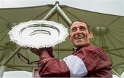 2 August 2017; Davy Russell celebrates with the Galway Plate after winning The Tote.com Galway Plate on Balko Des Flos during the Galway Races Summer Festival 2017 at Ballybrit, in Galway. Photo by Cody Glenn/Sportsfile