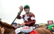 2 August 2017; Davy Russell celebrates as he enters the parade ring on Balko Des Flos after winning the The Tote.com Galway Plate during the Galway Races Summer Festival 2017 at Ballybrit, in Galway. Photo by Cody Glenn/Sportsfile