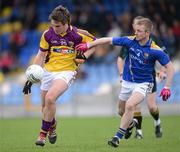 8 April 2012; Michael O'Regan, Wexford, in action against Declan Reilly, Longford. Allianz Football League Division 3, Round 7, Longford v Wexford, Glennon Brothers Pearse Park, Co. Longford. Picture credit: Ray McManus / SPORTSFILE
