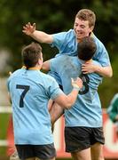 9 April 2012; Jamie Glynn, UCD, is congratulated by team-mates Mark McGroarty, left, and Eoin Joyce, right, after scoring his side's second try. Fraser McMullen All-Ireland Under 21 Cup Final, UCD v Old Belvedere, Lakelands Park, Terenure, Dublin. Photo by Sportsfile