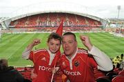 8 April 2012; Munster supporters Gavin Mellerick, aged 7, and Ian Mellerick, from Newport, Co. Tipperary. Heineken Cup Quarter-Final, Munster v Ulster, Thomond Park, Limerick. Picture credit: Diarmuid Greene / SPORTSFILE