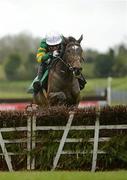 9 April 2012; Get Me Out Of Here, with Tony McCoy up, jump the last on their way to winning the Keelings Irish Strawberry Hurdle. Fairyhouse Racecourse, Co. Meath. Picture credit: Stephen McCarthy / SPORTSFILE
