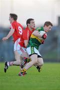 11 April 2012; Pa Kilkenny, Kerry, in action against john O'Rourke, Cork. Cadbury Munster GAA Football Under 21 Championship Final, Kerry v Cork, Austin Stack Park, Tralee, Co. Kerry. Picture credit: Diarmuid Greene / SPORTSFILE
