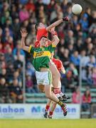 11 April 2012; Jack Sherwood, Kerry, in action against Mark Surgue, Cork. Cadbury Munster GAA Football Under 21 Championship Final, Kerry v Cork, Austin Stack Park, Tralee, Co. Kerry. Picture credit: Diarmuid Greene / SPORTSFILE