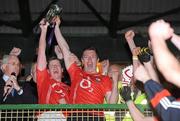 11 April 2012; Cork joint captains, Donal Og Hodnett, left, and Rory O'Sullivan lift the cup after victory over Kerry. Cadbury Munster GAA Football Under 21 Championship Final, Kerry v Cork, Austin Stack Park, Tralee, Co. Kerry. Picture credit: Diarmuid Greene / SPORTSFILE