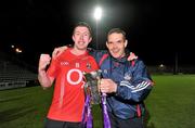 11 April 2012; Cork joint captain Rory O'Sullivan and goalkeeper coach Ger Keely, right, celebrate after the game. Cadbury Munster GAA Football Under 21 Championship Final, Kerry v Cork, Austin Stack Park, Tralee, Co. Kerry. Picture credit: Diarmuid Greene / SPORTSFILE