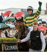 3 August 2017; Jockey Barry Geraghty celebrates after winning the Guinness Galway Hurdle Handicap on Tigris River during the Galway Races Summer Festival 2017 at Ballybrit, in Galway. Photo by Cody Glenn/Sportsfile