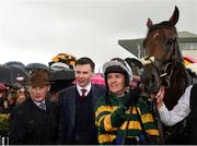 3 August 2017; Jockey Barry Geraghty celebrates with trainer Joseph O'Brien and Frank Berry, manager for JP McManus after winning the Guinness Galway Hurdle Handicap on Tigris River during the Galway Races Summer Festival 2017 at Ballybrit, in Galway. Photo by Cody Glenn/Sportsfile