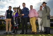 4 August 2017; The winning connections of Whiskey Sour including, from left, Aubrey McMahon, winning jockey on Whiskey Sour on Monday's Connacht Hotel (QR) Handicap and son of owner Luke McMahon, fourth from left, jockey Declan McDonogh, and trainer Willie Mullins after the Guinness Handicap during the Galway Races Summer Festival 2017 at Ballybrit, in Galway. Photo by Cody Glenn/Sportsfile