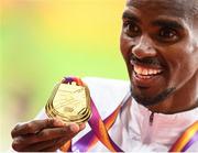 4 August 2017; Mo Farah of Great Britain with his gold medal after winning the final of the Men's 10,000m event during day one of the 16th IAAF World Athletics Championships at the London Stadium in London, England. Photo by Stephen McCarthy/Sportsfile