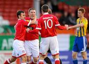 13 April 2012; Philip Hughes, Shelbourne, celebrates after scoring his side's first goal with team-mates David Cassidy, left, and Kevin Dawson. Airtricity League Premier Division, Shelbourne v Bray Wanderers, Tolka Park, Dublin. Photo by Sportsfile