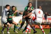 14 April 2012; George Naoupu, Connacht, is tackled by Tom Court, Lewis Stevenson, 4, and Ian Humphreys, left, Ulster. Celtic League, Connacht v Ulster, Sportsground, Galway. Picture credit: Barry Cregg / SPORTSFILE
