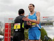 15 April 2012; Winner of the AAI Men's National 10km Championship Mark Kenneally, Clonliffe Harriers, right, with Jesus Espana, Spain, who finish the SPAR Great Ireland Run in 7th position, one ahead of Kenneally. Phoenix Park, Dublin. Picture credit: Stephen McCarthy / SPORTSFILE