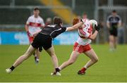 5 August 2017; Fergal Mortimer of Derry in action against Niall Colsh of Sligo during the Electric Ireland All-Ireland GAA Football Minor Championship Quarter-Final match between Derry and Sligo at Mac Cumhaill Park in Ballybofey, Donegal. Photo by Oliver McVeigh/Sportsfile