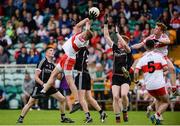 5 August 2017; Oisin McWilliams of Derry catches a high ball against Conan Marren of Sligo  during the Electric Ireland All-Ireland GAA Football Minor Championship Quarter-Final match between Derry and Sligo at Mac Cumhaill Park in Ballybofey, Donegal. Photo by Oliver McVeigh/Sportsfile
