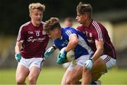 5 August 2017; Oisin Pierson of Cavan in action against Conor Campbell, left, and Sean Fitzgerald of Galway during the Electric Ireland All-Ireland GAA Football Minor Championship Quarter-Final match between Cavan and Galway at Páirc Seán Mac Diarmada in Carrick-on-Shannon, Leitrim. Photo by Barry Cregg/Sportsfile