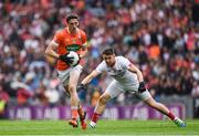 5 August 2017; Rory Grugan of Armagh in action against Matthew Donnelly of Tyrone during the GAA Football All-Ireland Senior Championship Quarter-Final match between Tyrone and Armagh at Croke Park in Dublin. Photo by Ray McManus/Sportsfile