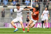 5 August 2017; Matthew Donnelly of Tyrone is tackled by James Morgan of Armagh during the GAA Football All-Ireland Senior Championship Quarter-Final match between Tyrone and Armagh at Croke Park in Dublin. Photo by Ramsey Cardy/Sportsfile