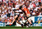 5 August 2017; Peter Harte of Tyrone in action against James Morgan of Armagh during the GAA Football All-Ireland Senior Championship Quarter-Final match between Tyrone and Armagh at Croke Park in Dublin. Photo by Ramsey Cardy/Sportsfile