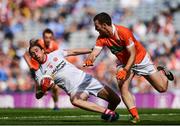 5 August 2017; Conall McCann of Tyrone is tackled by Joe McElroy of Armagh during the GAA Football All-Ireland Senior Championship Quarter-Final match between Tyrone and Armagh at Croke Park in Dublin. Photo by Ramsey Cardy/Sportsfile