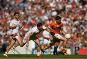5 August 2017; Rory Grugan of Armagh is tackled by Sean Cavanagh of Tyrone during the GAA Football All-Ireland Senior Championship Quarter-Final match between Tyrone and Armagh at Croke Park in Dublin. Photo by Ramsey Cardy/Sportsfile