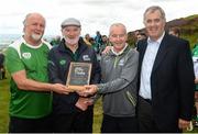 5 August 2017; Damian Callan, second from left, winner of the first ever Poc Fada in 1960, is presented with the Poc Fada Hall of Fame Award by, from left, Poc Fada sponsor Martin Donnelly of MD Sport, Chairman of the Ulster Council Michael Hasson and Poc Fada Chairman Humphrey Kelleher at the 2017 M Donnelly GAA All-Ireland Poc Fada Finals in the Annaverna Mountain, Ravensdale, Co Louth. Photo by Piaras Ó Mídheach/Sportsfile