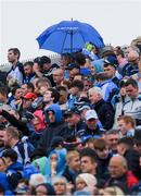 5 August 2017; Supporters on Hill 16 use an umberella to shade a small child from the prevailing rain during the GAA Football All-Ireland Senior Championship Quarter-Final match between Dublin and Monaghan at Croke Park in Dublin. Photo by Ray McManus/Sportsfile