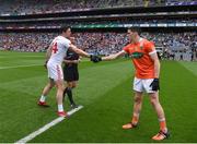 5 August 2017; Tyrone captain Seán Cavanagh shakes hands with Armagh captain Rory Grugan ahead of the GAA Football All-Ireland Senior Championship Quarter-Final match between Tyrone and Armagh at Croke Park in Dublin. Photo by Daire Brennan/Sportsfile