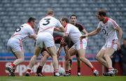 15 April 2012; Peter Turley, Down, under pressure from Cork players, from left, Noel O'Leary, Michael Shields, Paudie Kissane and Alan O'Connor. Allianz Football League Division 1 Semi-Final, Cork v Down, Croke Park, Dublin. Picture credit: Brendan Moran / SPORTSFILE