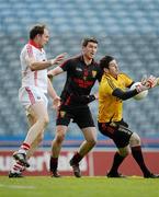 15 April 2012; Down goalkeeper Brendan McVeigh drops the ball under pressure from team-mate Peter Turley and Cork's Alan O'Connor which led to Cork's second goal, scored by O'Connor. Allianz Football League Division 1 Semi-Final, Cork v Down, Croke Park, Dublin. Picture credit: Brendan Moran / SPORTSFILE