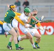 15 April 2012; Paul Divilly, Kildare, in action against Paul Fagan, left, and James Togher, Meath. Allianz Hurling League Division 2B Final, Kildare v Meath, Parnell Park, Dublin. Picture credit: Ray Lohan / SPORTSFILE