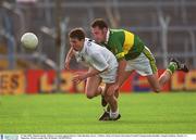 27 July 2002; Damien Hendy, Kildare, in action against Kerry's John Sheehan. Kerry v Kildare, Bank of Ireland All-Ireland Football Championship Qualifier, Semple Stadium, Thurles, Co. Tipperary. Picture credit; Ray McManus / SPORTSFILE