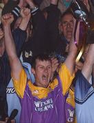 30 July 2002; Wexford captain Darren Stamp celebrates with the cup. Leinster U-21 Hurling Final, Dublin v Wexford, O'Moore Park, Portlaoise, Co. Laois. Picture credit; Brendan Moran / SPORTSFILE *EDI*