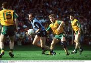 20 September 1992; Tom Carr, Dublin, is tackled by Tony Boyle, Donegal. All Ireland Football Championship Final, Dublin v Donegal, Croke Park, Dublin. Picture credit; Ray McManus / SPORTSFILE