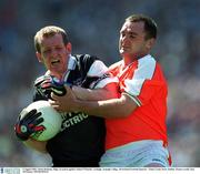 4 August 2002; Mark Brehony, Sligo, in action against Aidan O'Rourke, Armagh. Armagh v Sligo, All Ireland Football Quarter - Final, Croke Park, Dublin. Picture credit; Ray McManus / SPORTSFILE