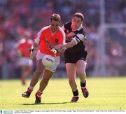 4 August 2002; Barry O'Hagan, Armagh, in action against John McPartland, Sligo. Armagh v Sligo, All Ireland Football Quarter - Final, Croke Park, Dublin. Picture credit; Ray McManus / SPORTSFILE