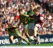 4 August 2002; Galway's Michael Donnellan scores his sides only goal despite the attentions of Kerry's Michael McCarthy. Kerry v Galway, All Ireland Football Quarter - Final, Croke Park, Dublin. Picture credit; Brian Lawless / SPORTSFILE