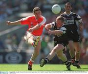 4 August 2002; Armagh's Diarmuid Marsden in action against Sligo's Mark Cosgrove. Armagh v Sligo, All Ireland Football Quarter - Final, Croke Park, Dublin. Picture credit; Ray McManus / SPORTSFILE