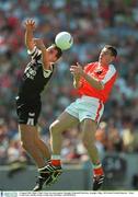 4 August 2002; Sligo's Nigel Clancy in action against Armagh's Diarmuid Marsden. Armagh v Sligo, All Ireland Football Quarter - Final, Croke Park, Dublin. Picture credit; Ray McManus / SPORTSFILE