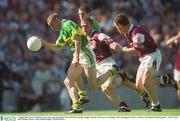 4 August 2002; Sean O'Sullivan, Kerry, goes past Sean Og de Paor and Declan Meehan (right), Galway, on his way to scoring his sides opening goal . Kerry v Galway, All Ireland Football Quarter - Final, Croke Park, Dublin. Picture credit; Damien Eagers / SPORTSFILE