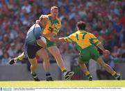 5 August 2002; Shane Ryan, Dublin, in action against Donegal's Raymond Sweeney and Damien Diver (17). Dublin v Donegal, All Ireland Football Quarter - Final, Croke Park, Dublin. Picture credit; Ray McManus / SPORTSFILE