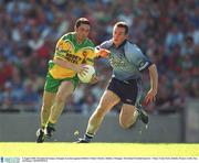 5 August 2002; Brendan Devenney, Donegal, in action against Dublin's Paddy Christie. Dublin v Donegal, All Ireland Football Quarter - Final, Croke Park, Dublin. Picture credit; Ray McManus / SPORTSFILE