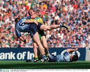 5 August 2002; Brendan Devenney, Donegal and Dublin's Jonathan Magee tussle off the ball. Dublin v Donegal, All Ireland Football Quarter - Final, Croke Park, Dublin. Picture credit; David Maher / SPORTSFILE